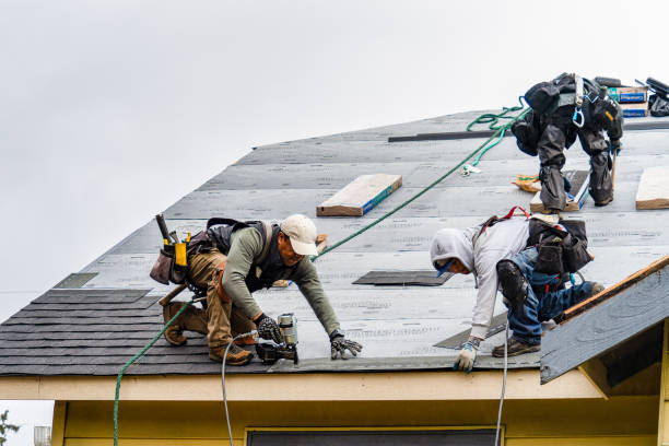 Professional Roof Replacement technician working in Mickleton, NJ